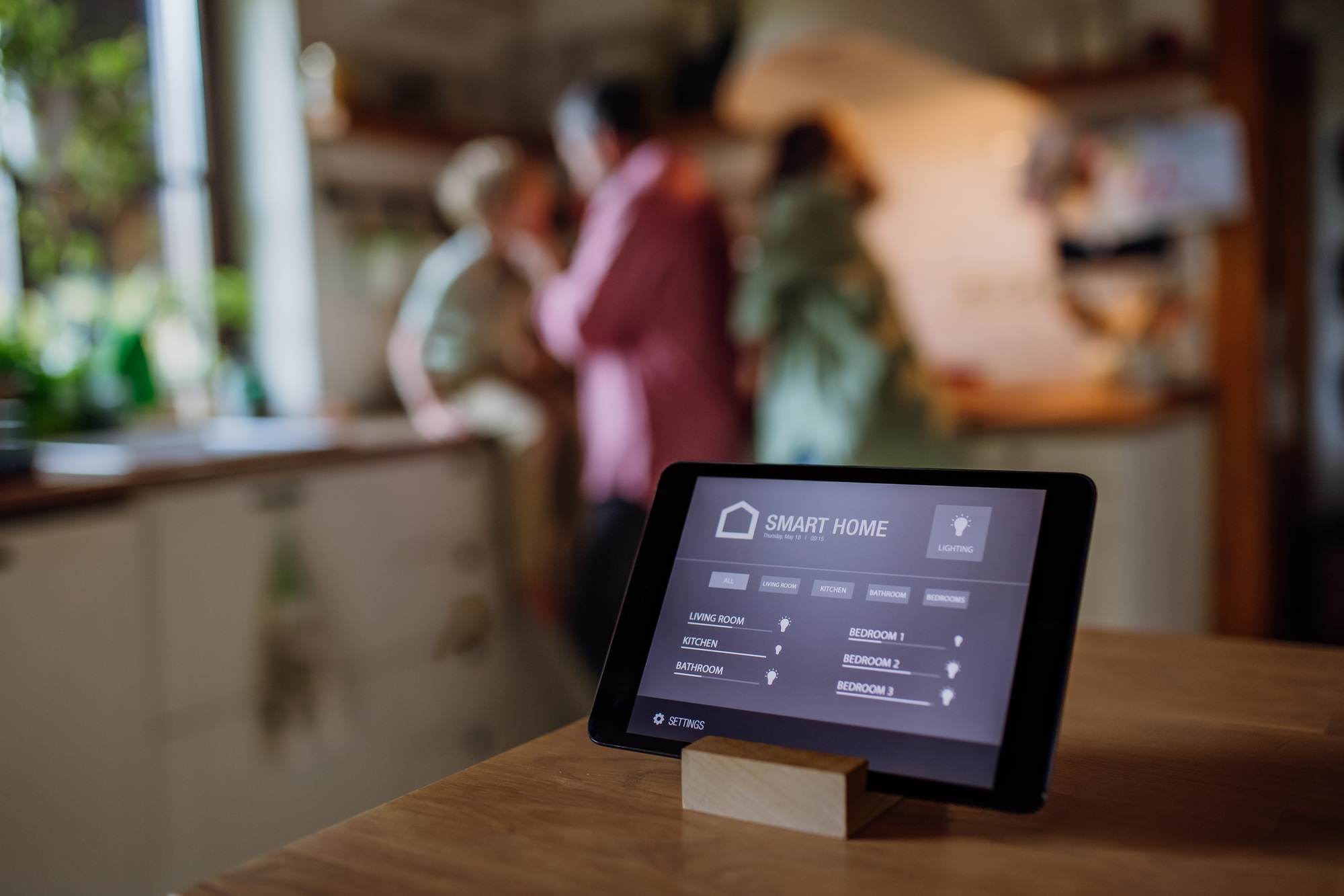 Close up of smart thermostat at home, adjusting, lowering heating temperature at home. Concept of